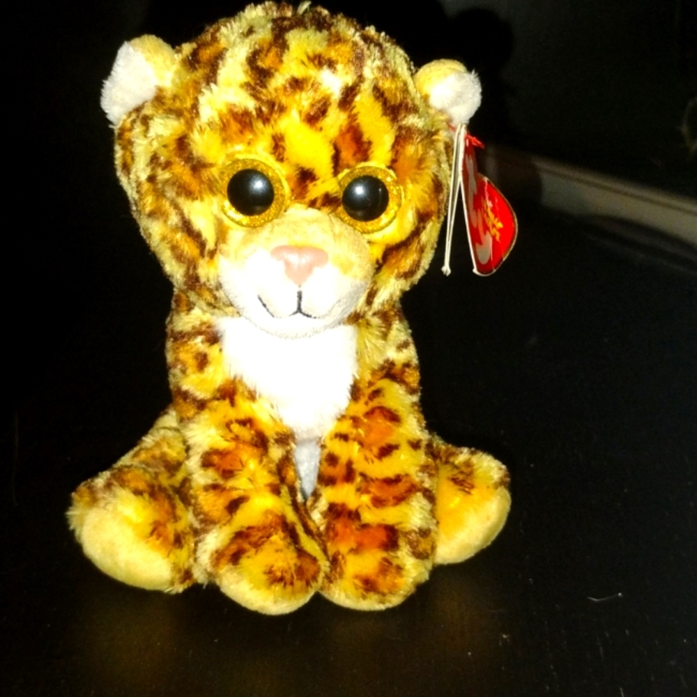 Ty  beanie baby named Spotty the leopard! Looks like new!
